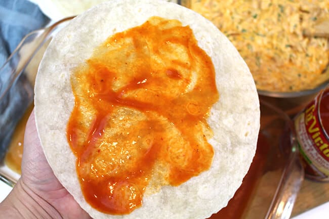 How to prep the tortillas for the enchilada filling