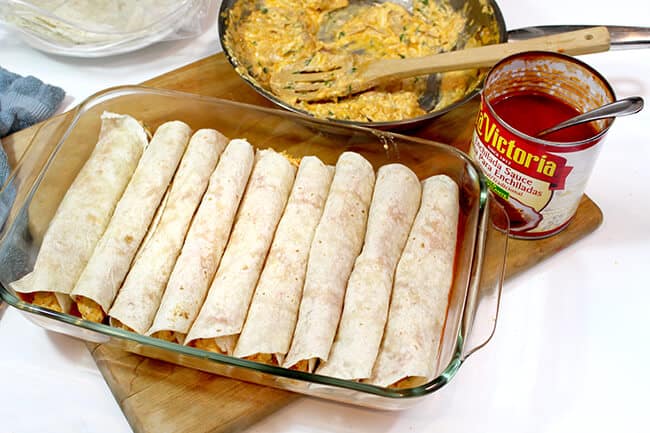 Rolled enchiladas in a baking dish