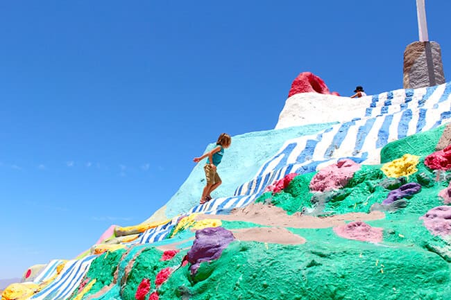 Climbing up Salvation Mountain