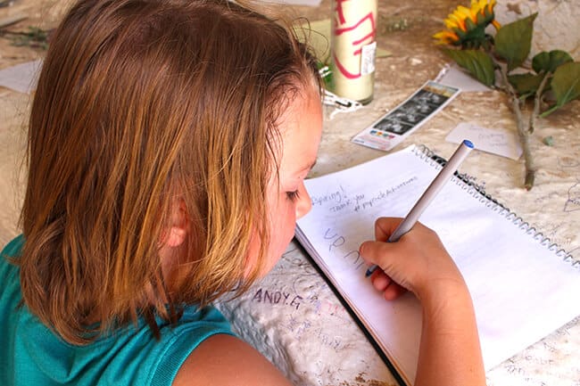 Signing the book at Salvation Mountain