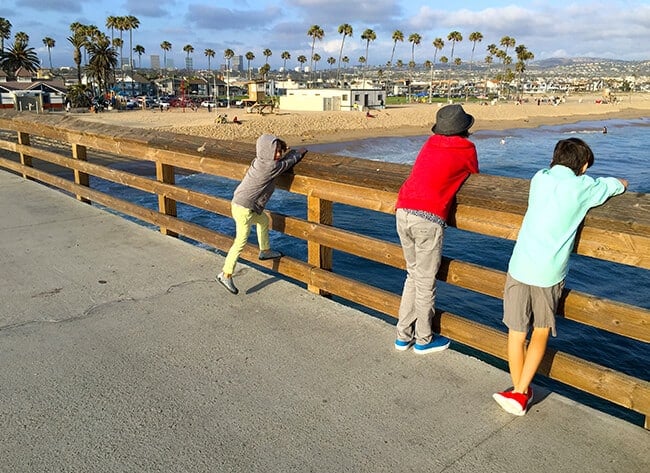 Wearing Crocs at Balboa Beach